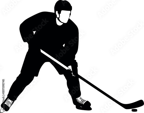 Photography Hockey player in action with stick and puck
