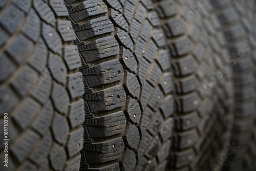 A close-up of a stack of winter tires