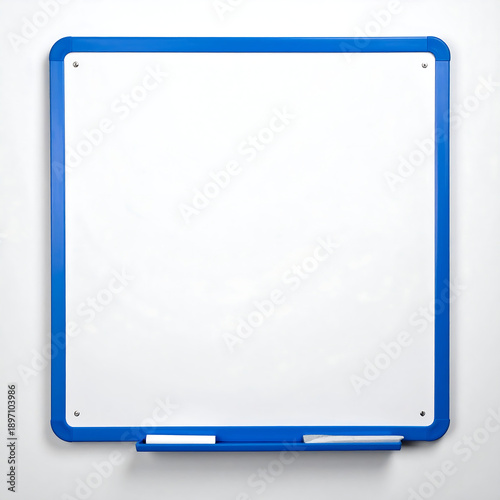 Square whiteboard framed in blue, mounted on a wall, with marker tray