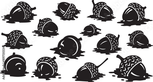 Black and white illustration of acorns on a surface