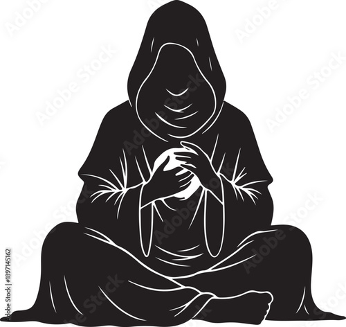 Person sitting in meditation pose with hooded robe