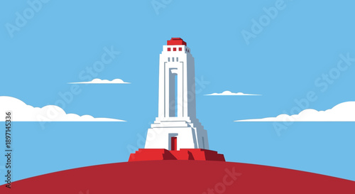 A majestic monument standing tall on a hilltop with clouds in the background