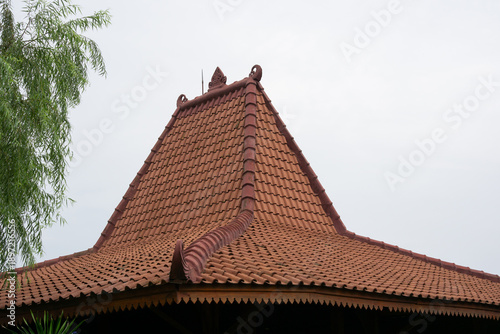 Tableau sur toile Traditional Javanese Joglo House Roof with Terracotta Tiles