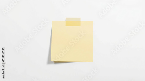 Minimalist yellow sticky note with slightly curled edges on a clean white background, accompanied by soft natural shadow and transparent tape at the top center.