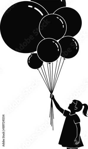 Little girl silhouette holding a large bunch of balloons looking up at the sky for birthday party celebration and childhood dreams