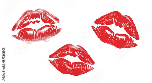 Three vibrant red lipstick kiss prints on a white background.