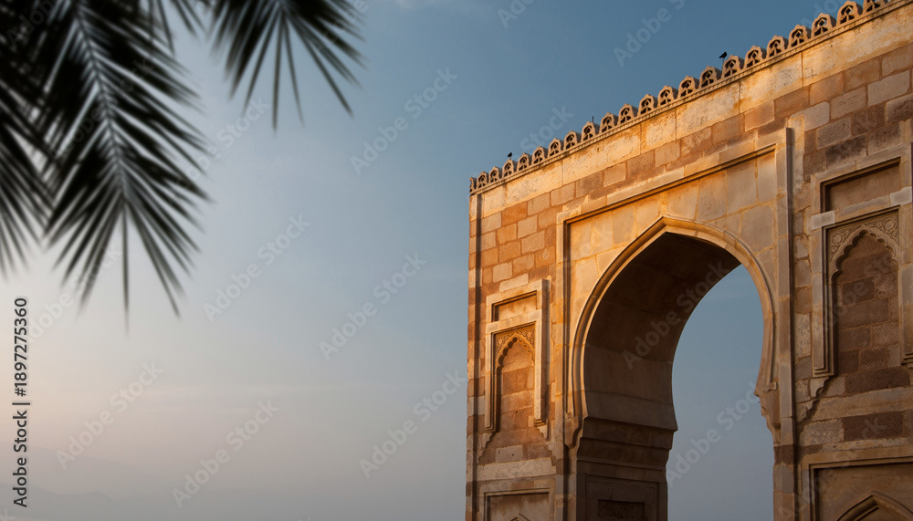 Fototapeta premium Ornate Archway on an Islamic Building with Palm Leaves