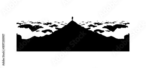Silhouette of a Person Standing on a Mountain Peak