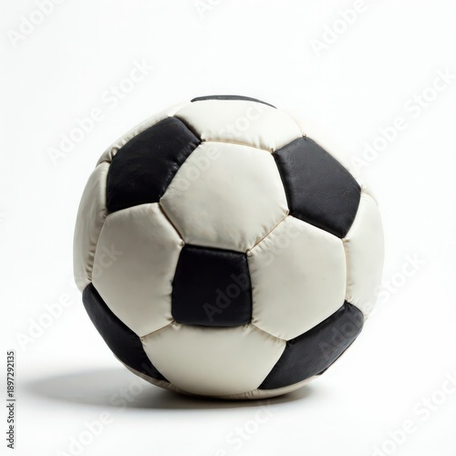 Classic black and white soccer ball poised on a clean white background, ideal for sports graphics and branding.