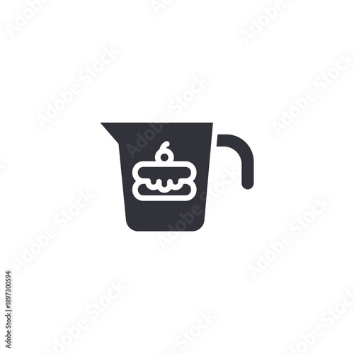 Measuring cup with cake icon symbolizing baking ingredients preparation and pastry cooking process.