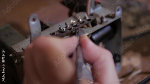 repair of capacitors on an old microcircuit using a soldering iron