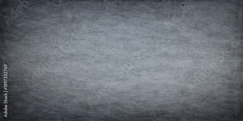 A dark aged grunge metal plate with a rough textured surface and vintage gray concrete patterns creates a dirty old wall backdrop for a blank black stone design