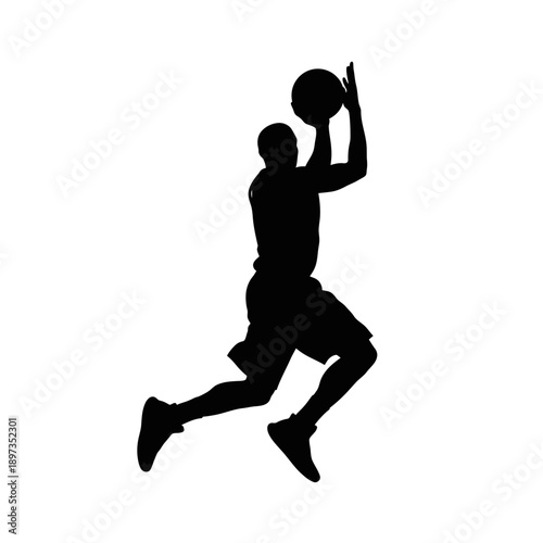 Silhouette of a basketball player jumping to shoot the ball during a game.