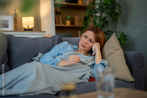 Fotografija Woman feeling unwell suffering from flu or cold virus