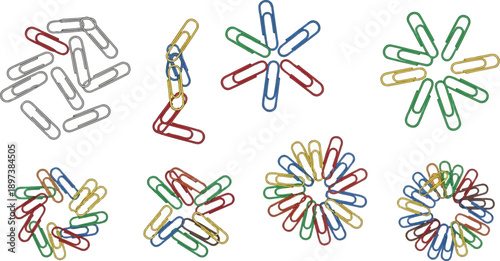 Various colorful paper clips arranged in piles, chains, and intricate circular patterns on a white background