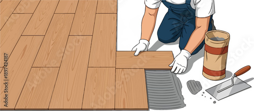 Worker laying down wood flooring with adhesive and tools