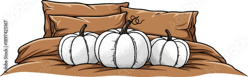 A cozy arrangement of white pumpkins on a bed with brown bedding