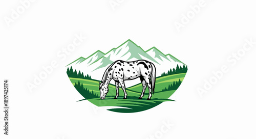 A spotted horse grazes peacefully in a valley with mountains behind