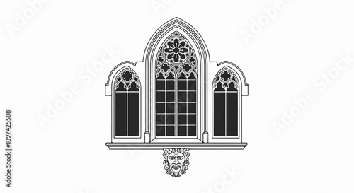 Ornate Gothic window with intricate tracery and a grotesque face carving