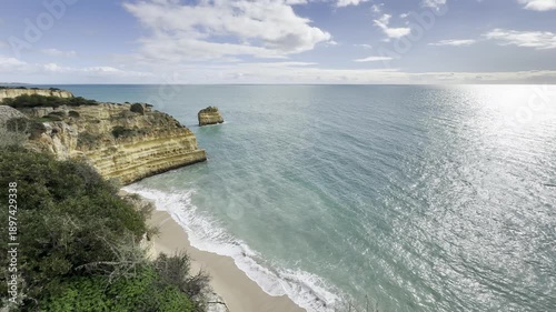 Landscape with beautiful Praia da Marinha, one of the most famous beaches of Portugal, located on the Atlantic coast in Lagoa, Algarve.