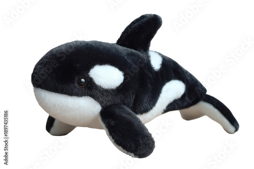 A stuffed black and white whale