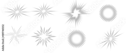 Collection of various white starburst and lens flare effects on a dark background
