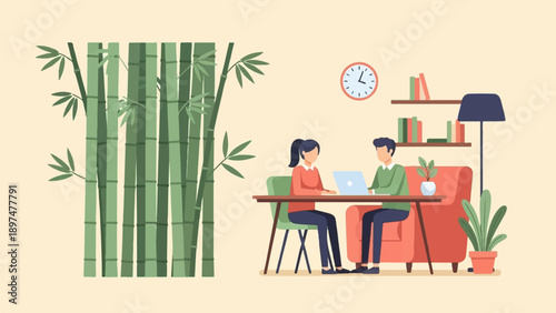 Two people work on laptops next to bamboo and indoor plants