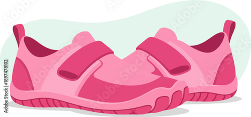 Two pink children's water shoes with velcro straps, isolated