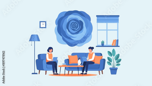 Two people working on laptops in a living room with a cat