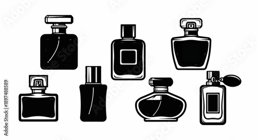 Collection of seven black and white perfume bottles in various shapes and sizes