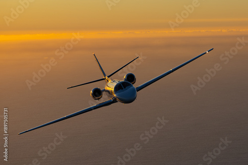 Fotografija Business jet (Citation Encore ) in a turn, in beautiful light sunset light over
