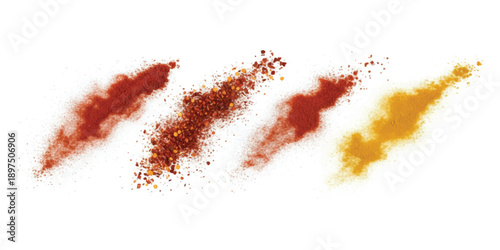 A vibrant display of different ground spices, including red chili powder, chili flakes, and turmeric, on a white surface