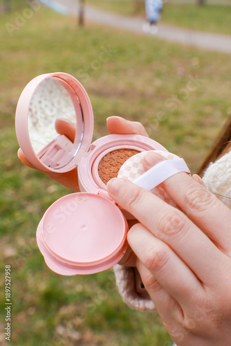 Beauty concept with woman holding cushion . Korean beauty
