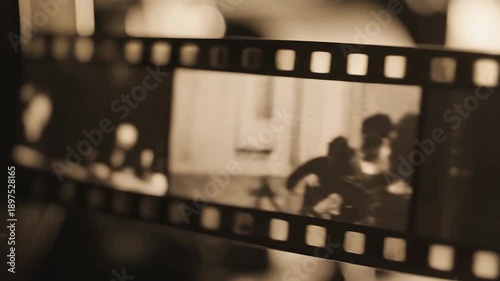 Vintage film strip with sepia toned photos, cinematic, nostalgic, retro, historical memories