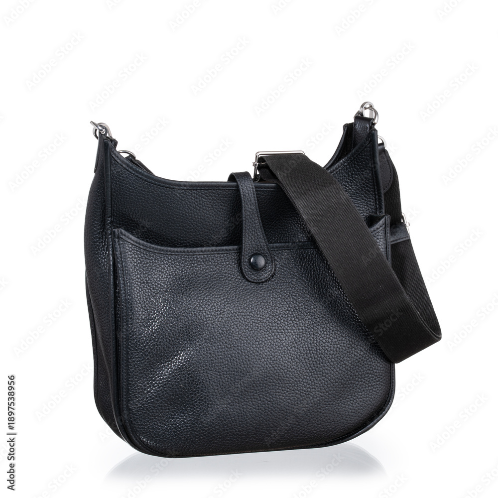 Naklejka premium black leather shoulder bag, photographed on a white background.