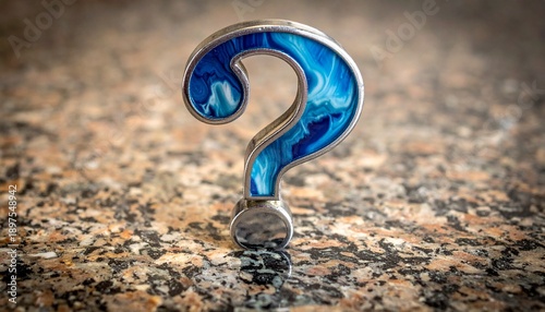 Glossy metallic blue question mark on stone surface symbolizing curiosity inquiry uncertainty and search for knowledge