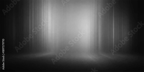 An empty dark room featuring a black and white grunge metal wall and brushed steel floor illuminated by a silver spotlight on a textured metallic surface backdrop