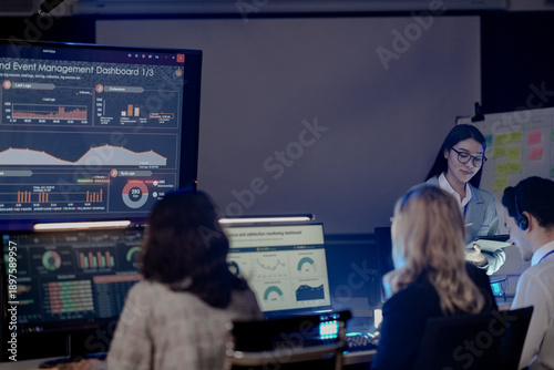 Konstfotografi Dynamic night ops hub action Diverse team collaborates intensely analyzing critical data screens leader provides guidance modern command center buzz achieves mission goals now teamwork boost