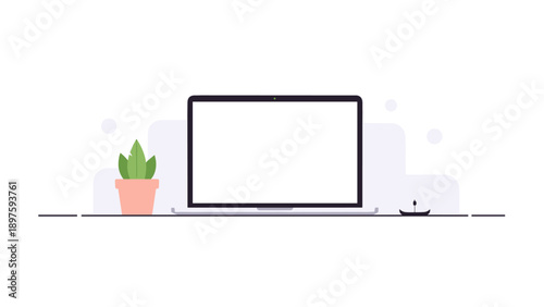 Modern minimalist workspace with laptop and plant on desk