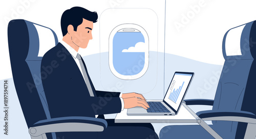 Businessman Working Remotely On A Laptop Inside An Airplane Cabin While Traveling