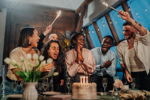 Wallpaper Mural Diverse friends celebrating birthday party, happy people gathering with cake, candles, and sparklers Torontodigital.ca