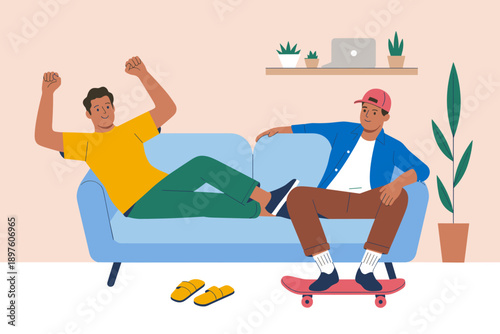 Two cool young men relaxing at home on couch with skateboard and laptop in modern living room interior design concept friends chilling out together enjoying free time and comfortable lifestyle for soc
