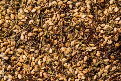 Fotografija Egyptian dukkah spice blend featuring toasted pine nuts, sesame seeds, dried her