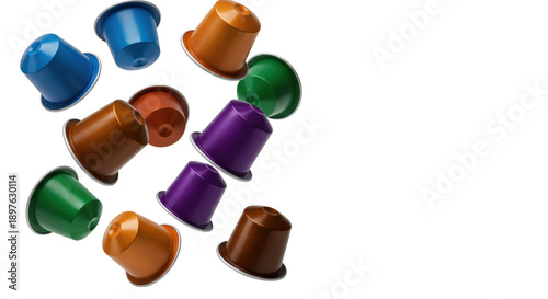 Vibrant Nespresso-style coffee capsules with glossy blue, purple, green, orange, brown tops and silver bases, floating dynamically against a transparent background with copy space, concept of premium