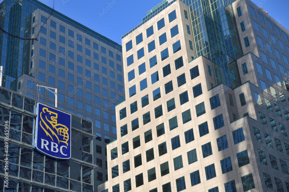 Fototapeta premium grid geometric window arrangement at Water Park Place and corporate logo sign of Royal Bank of Canada (RBC WaterPark Place), Toronto