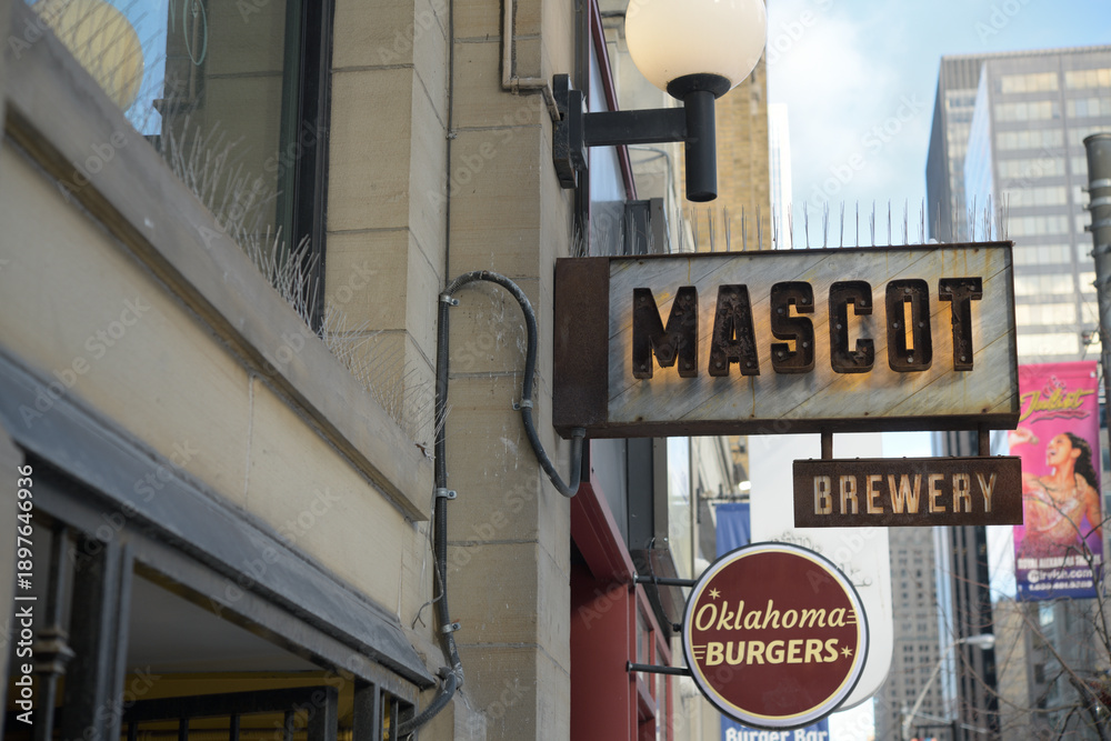 Obraz premium projecting signs outside Mascot Brewery and Restaurant and Oklahoma Burgers at 220 and 214 King St W, Toronto