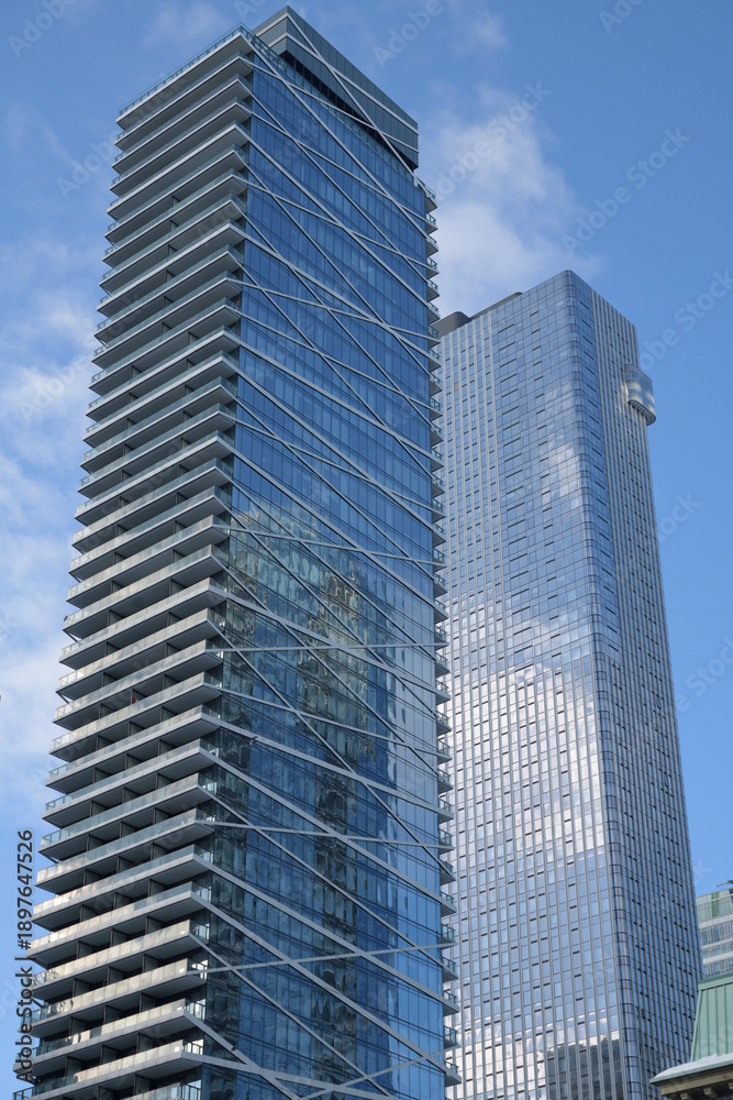 Fototapeta premium view of (left) Theatre Park condominium at 224 King St W and (right) south east elevation of Thomson Reuters (19 Duncan St), Toronto