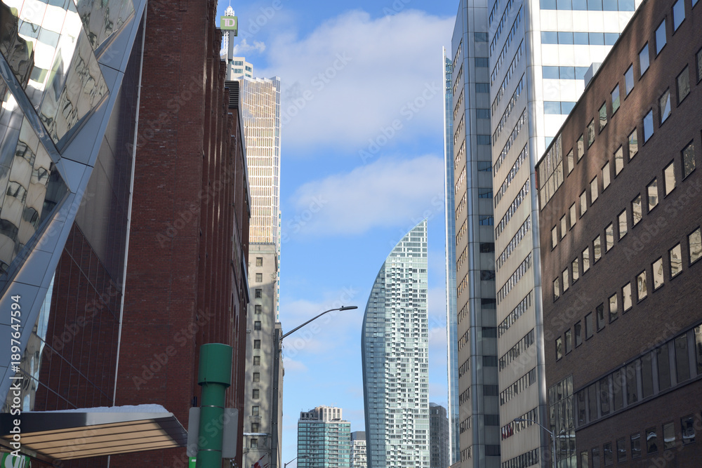 Obraz premium looking east on Front St W to L-Tower condo, Toronto