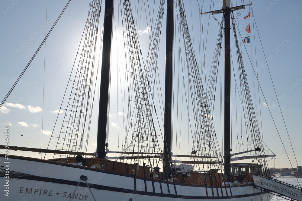 Fototapeta premium The Empire Sandy, a large passenger sailing ship, moored in Toronto Harbor in winter