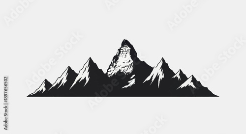 Majestic mountain range silhouette against a light background.